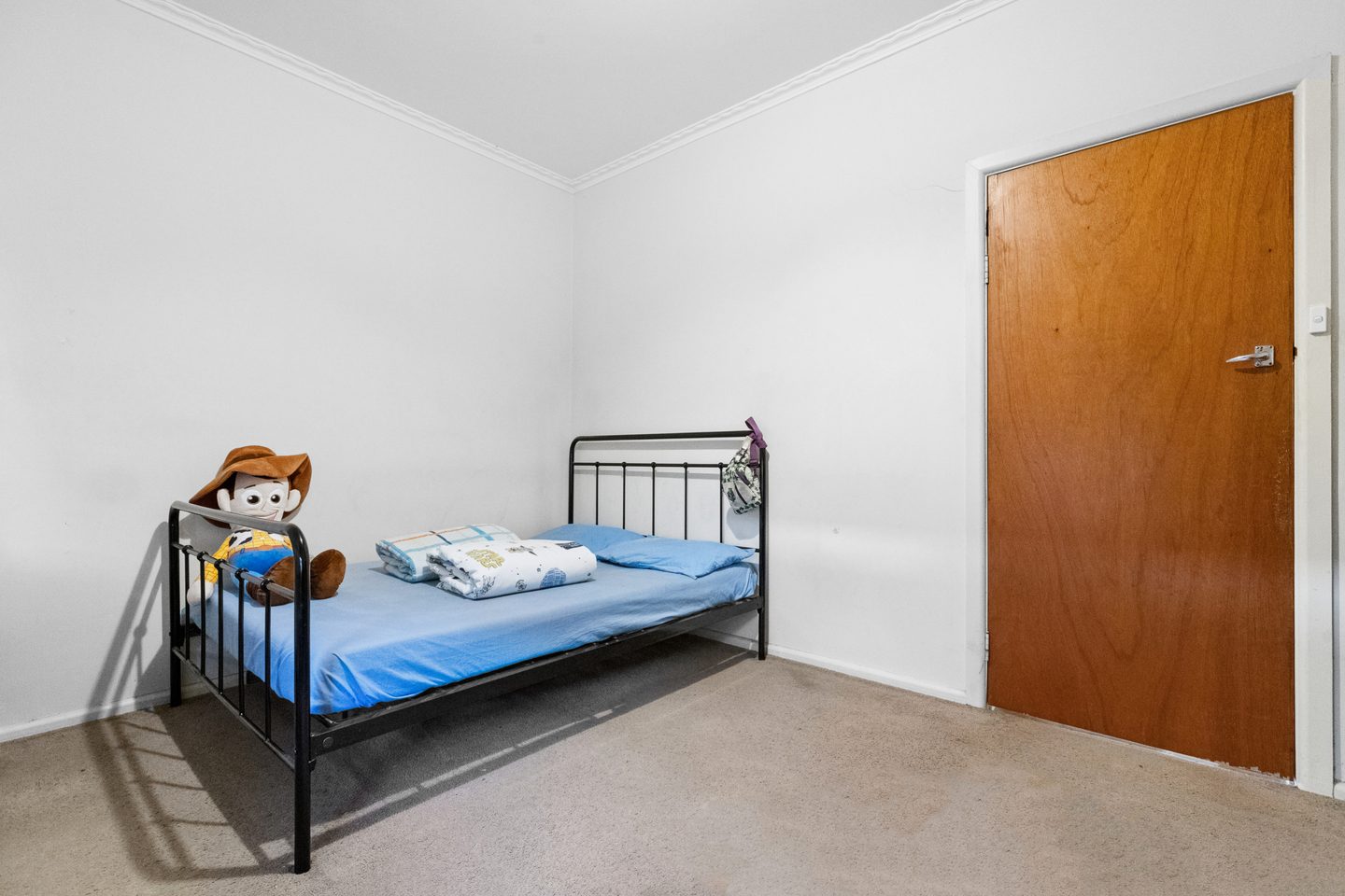 Bedroom, looking towards the door